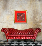 Planet B - Heart Art Original  - on clay colored brick wall in living room with red leather settee