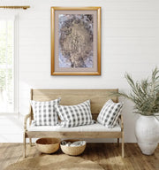 Queen Earth - Heart Art Original - on light grey wall with sitting bench and checkered cushions