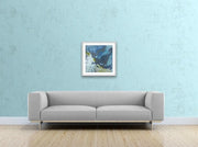 Blow Away Bad Memories - Heart Art Original  -  on pale blue wall with grey couch