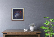 The Earth’s Origins - a Big Bang  - on grey wall with wooden desk and plant