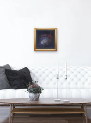 The Earth’s Origins - a Big Bang  - on white wall with white settee, dark cushions, wooden oval table and two candle holders