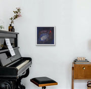 The Earth’s Origins - a Big Bang  - on light blue wall with black piano and pianist chair
